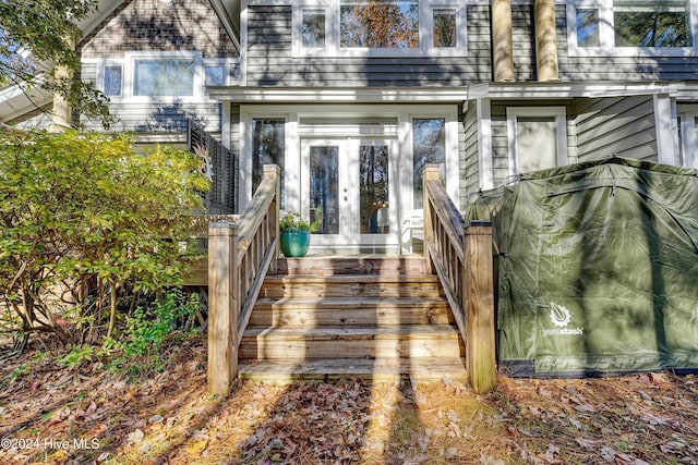 entrance to property featuring french doors