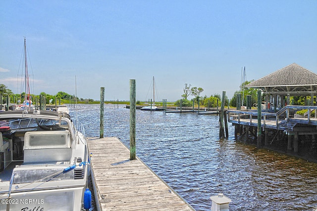 view of dock with a water view