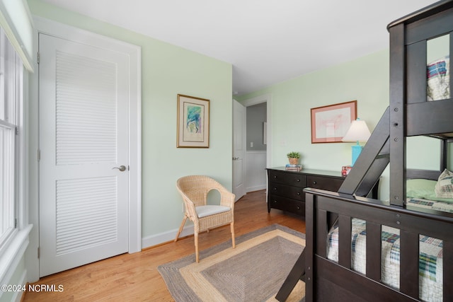 bedroom featuring light wood-type flooring