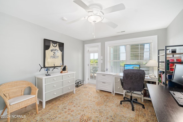 office space with ceiling fan