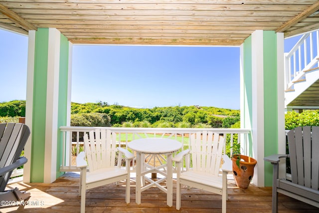 wooden balcony featuring a wooden deck