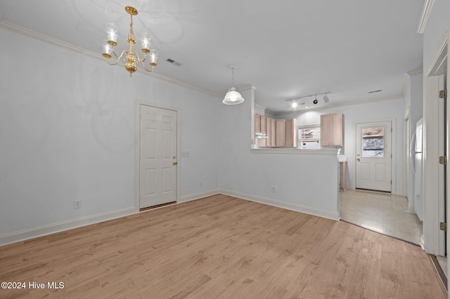 interior space with an inviting chandelier, ornamental molding, and light wood-type flooring