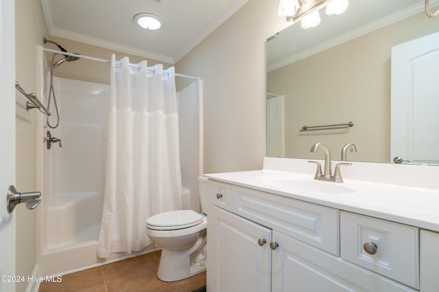 bathroom featuring toilet, vanity, tile patterned floors, and crown molding