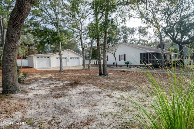 view of yard featuring a garage