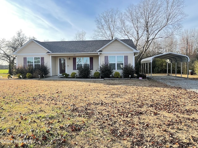 ranch-style house with a carport