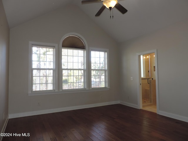 spare room featuring dark hardwood / wood-style flooring, ceiling fan, and a healthy amount of sunlight