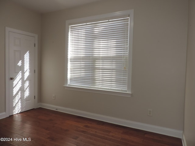 entrance foyer with dark hardwood / wood-style flooring