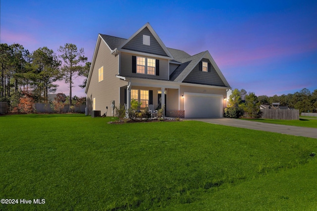 craftsman-style house featuring a porch, a yard, and central air condition unit