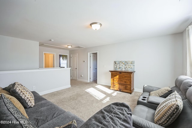 living room featuring light carpet