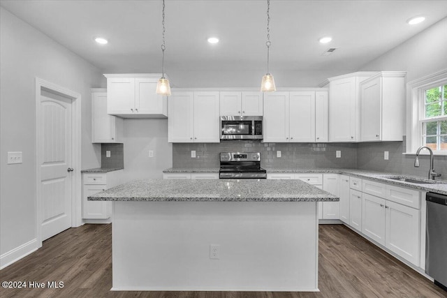 kitchen with white cabinets, sink, and stainless steel appliances