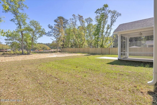 view of yard with fence