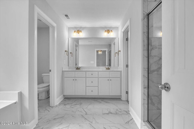 bathroom with vanity, toilet, and walk in shower