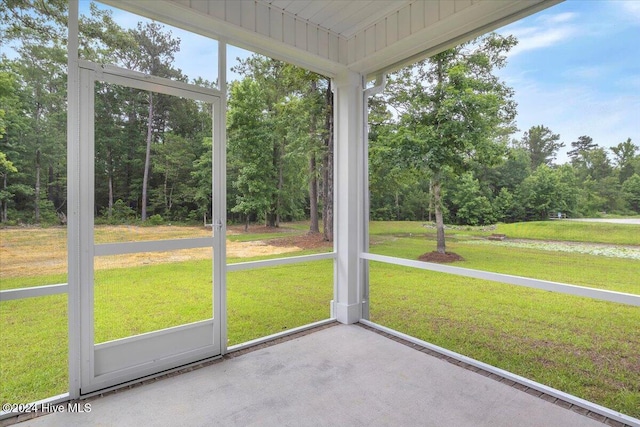 unfurnished sunroom featuring wooden ceiling