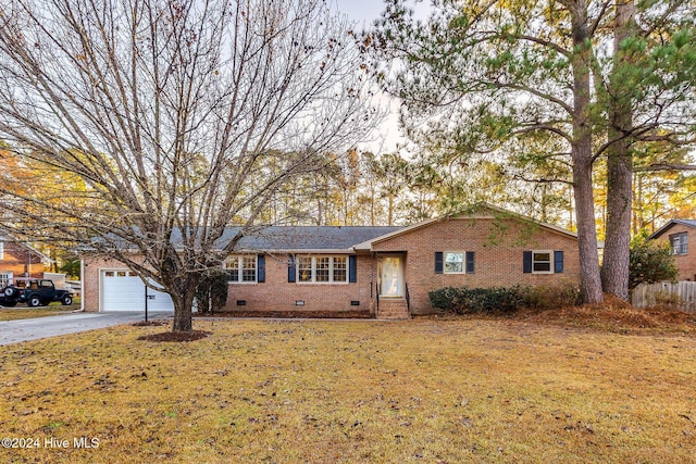 ranch-style home with a front lawn