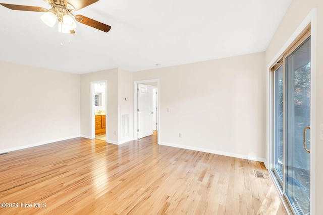 unfurnished room featuring light hardwood / wood-style flooring and ceiling fan