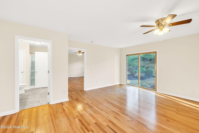 spare room with ceiling fan and light hardwood / wood-style flooring