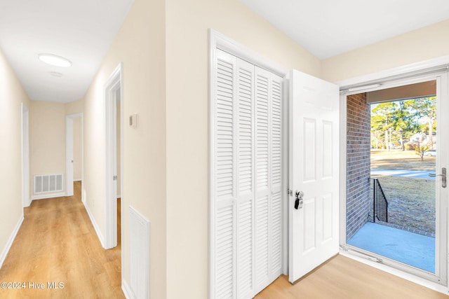 hallway featuring light hardwood / wood-style floors