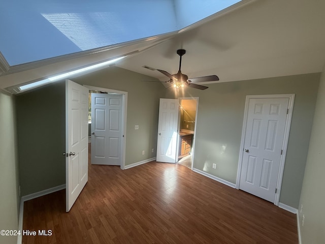 unfurnished bedroom featuring hardwood / wood-style floors and ceiling fan