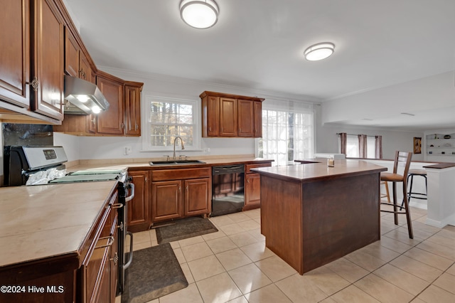 kitchen with dishwasher, a center island, sink, stove, and light tile patterned floors