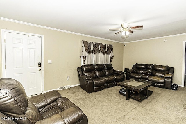 living room featuring ceiling fan, carpet, and ornamental molding