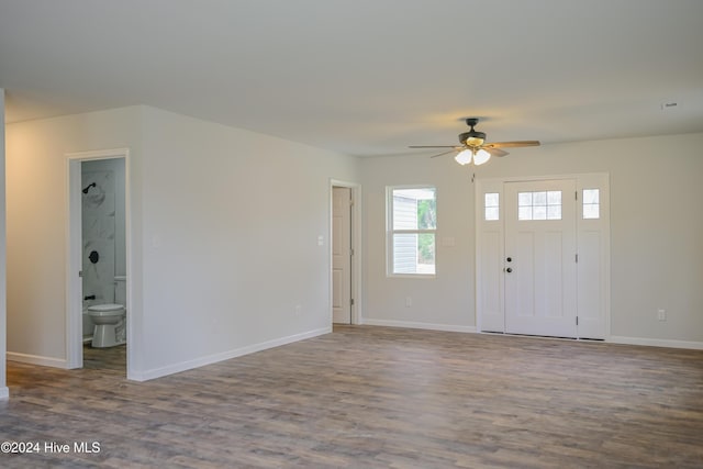 foyer with wood-type flooring and ceiling fan