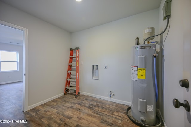 utility room featuring electric water heater