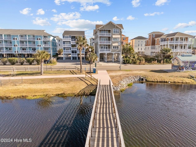 dock area featuring a water view