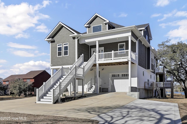 view of front of property with a garage and a porch