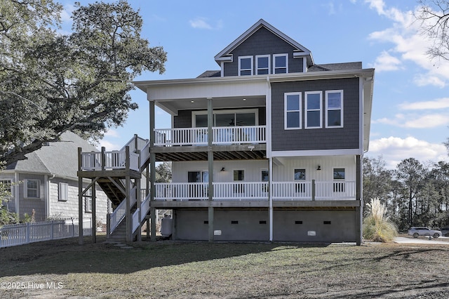 rear view of property with a yard