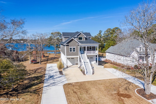 view of front of home with a garage and a porch