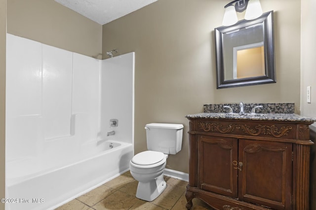 full bathroom featuring tile patterned flooring, a textured ceiling,  shower combination, toilet, and vanity