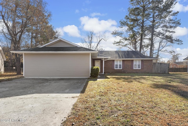 single story home with a front lawn