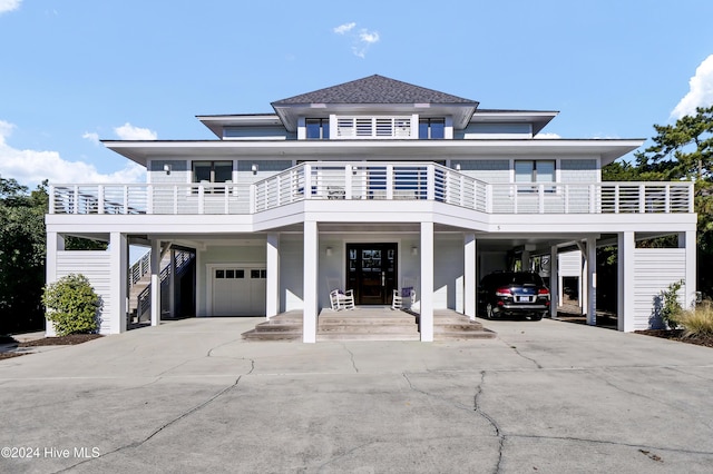 view of front of home with a carport