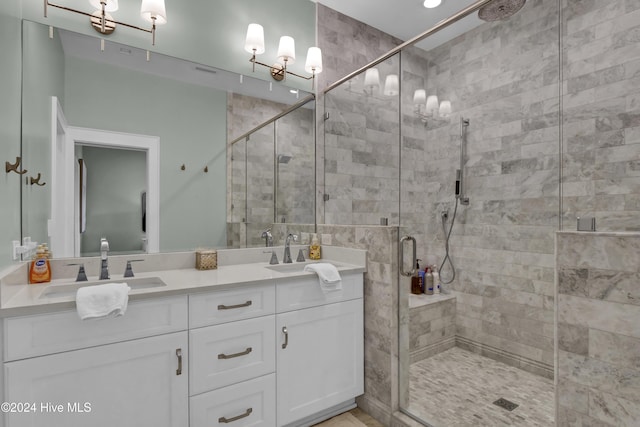 bathroom with vanity and walk in shower