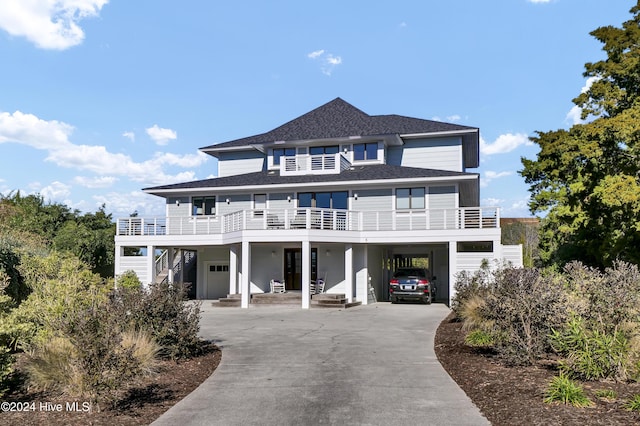 view of front of property with a carport