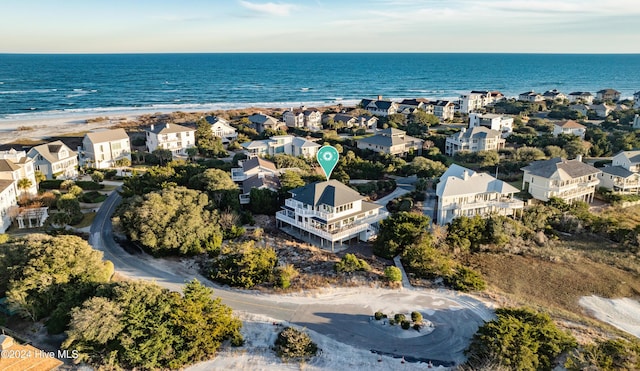 bird's eye view with a beach view and a water view