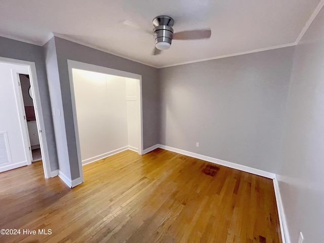 interior space featuring crown molding, ceiling fan, and light hardwood / wood-style floors