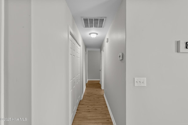 hall featuring light wood-type flooring