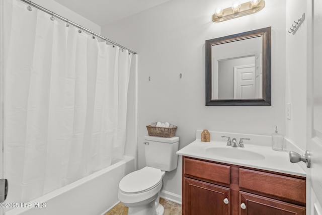 full bathroom featuring shower / bath combo with shower curtain, toilet, and vanity