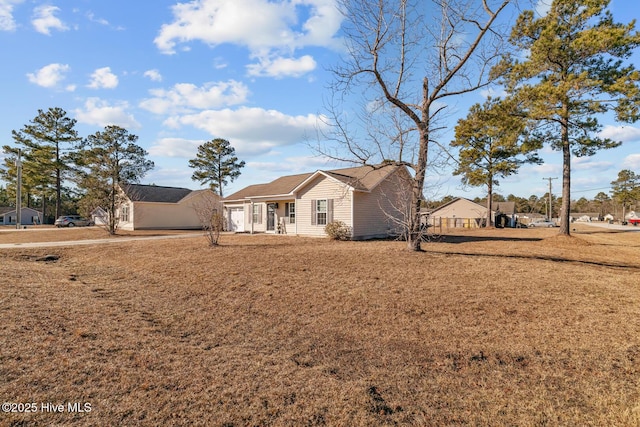 view of front of house with a front lawn