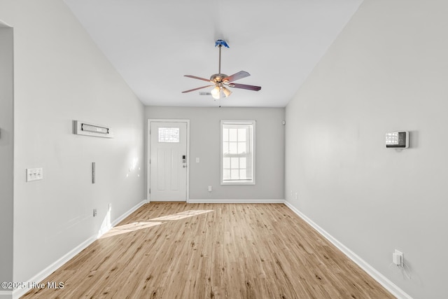 entryway with ceiling fan and light hardwood / wood-style flooring