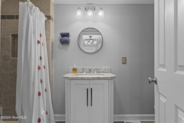 bathroom with a shower with shower curtain and vanity