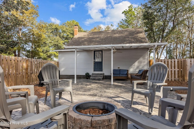 view of patio featuring a fire pit