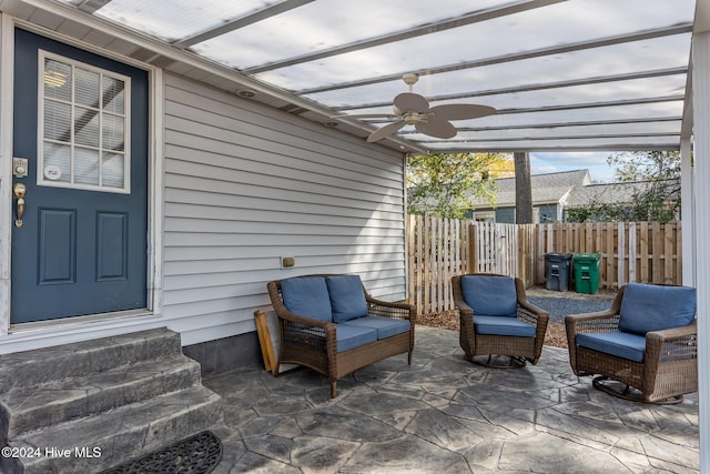 view of patio featuring ceiling fan