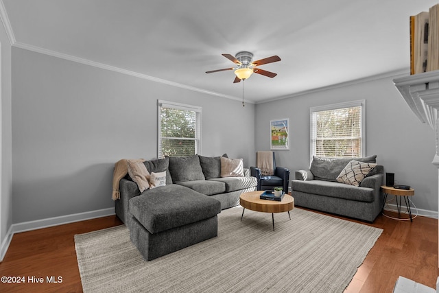 living room featuring crown molding, ceiling fan, hardwood / wood-style floors, and a healthy amount of sunlight