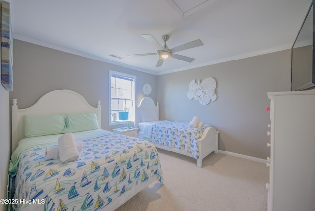 carpeted bedroom with ceiling fan and ornamental molding