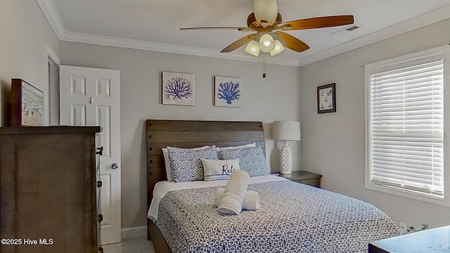 bedroom with ceiling fan, carpet floors, and ornamental molding