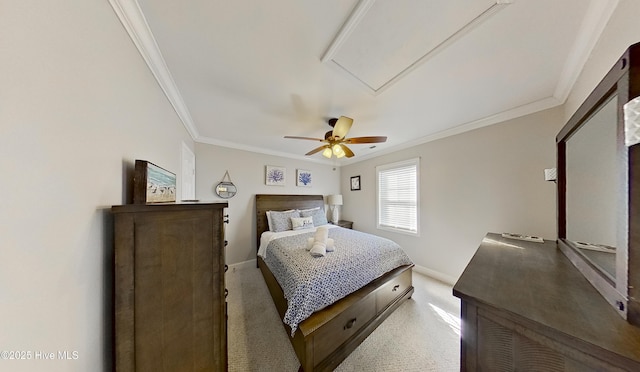 carpeted bedroom with ceiling fan and ornamental molding