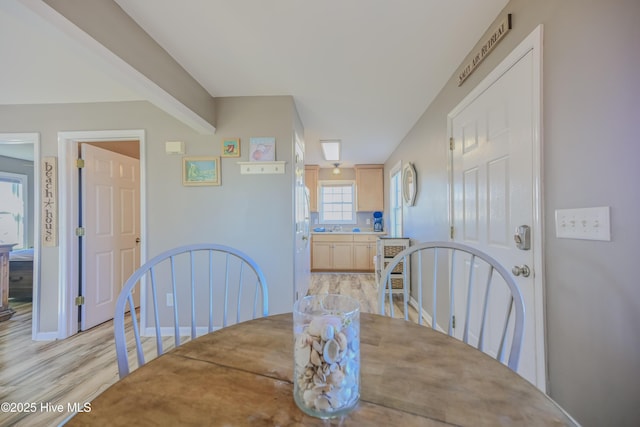 dining area with light hardwood / wood-style flooring