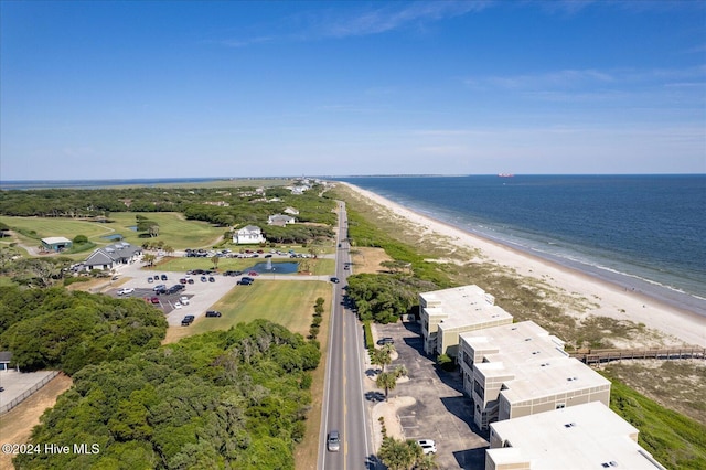 aerial view featuring a water view and a beach view